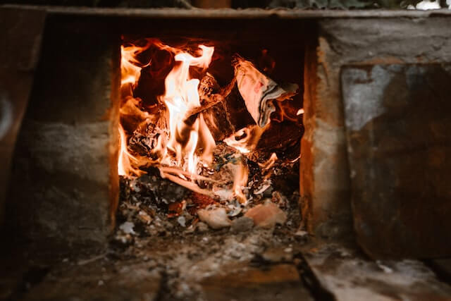 image of paper burning in fireplace